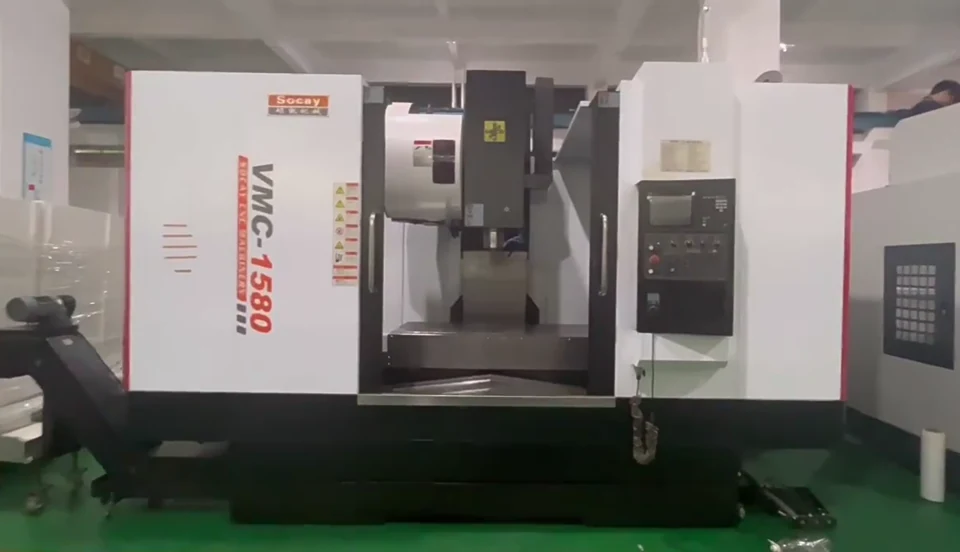 Enclosed vertical CNC milling machine on the workshop floor